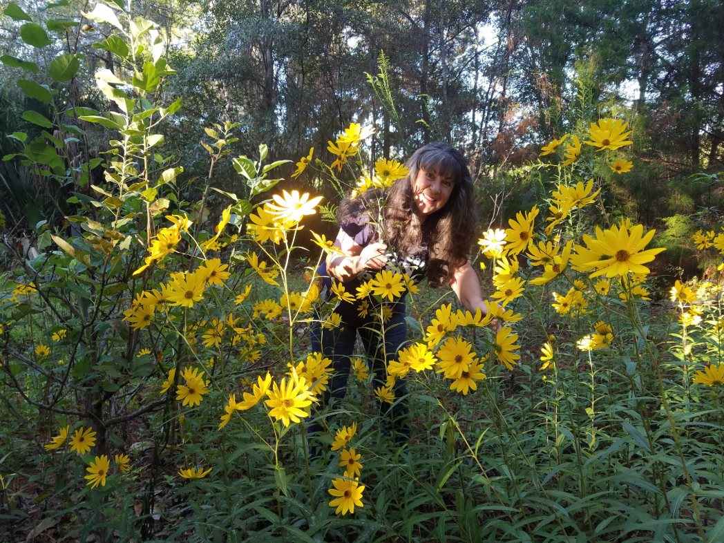 Gail Taylor among sunflowers