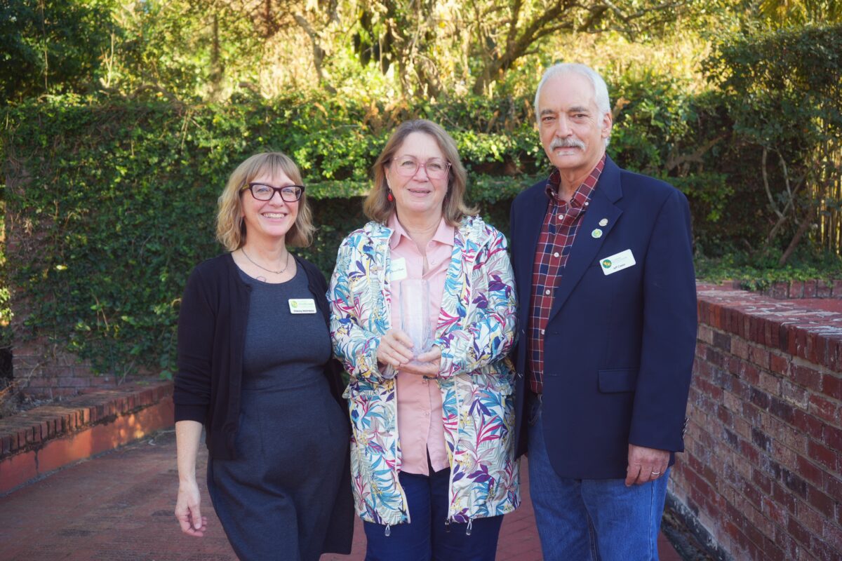 Cameron "Cammie" Donaldson receiving the 2025 Coreopsis award with FWF ED Stacey Matrazzo (left) and FWF Board Member Jeff Caster (right).