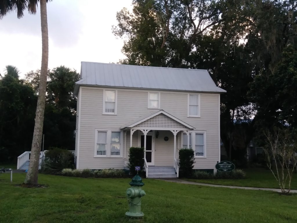 Albertus Cottage with a grass lawn before wildflower garden planting.