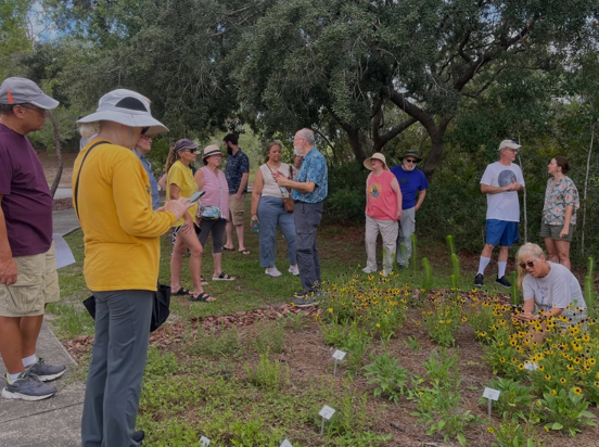 Outreach event in the native plant garden at Deltona Regional Library.